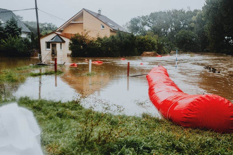 Flooded street drain in Punta Gorda Florida neighborhood after heavy summer rainstorm