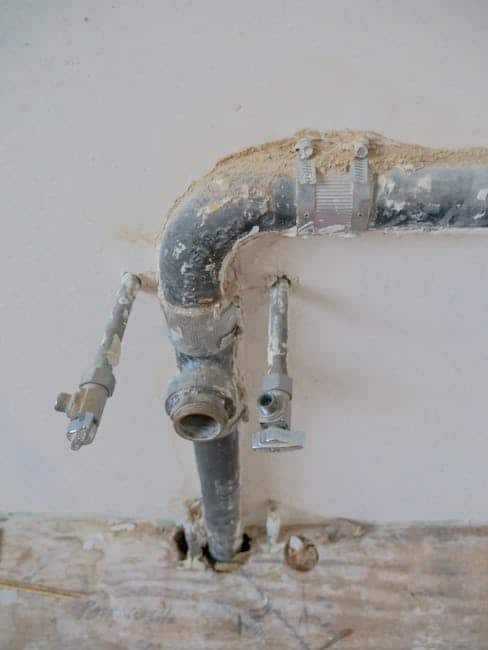 PEX-A pipe being run through a slab-on-grade home during a whole-house repipe in Fort Myers