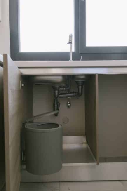 Under-sink reverse osmosis system installed in a Cape Coral kitchen